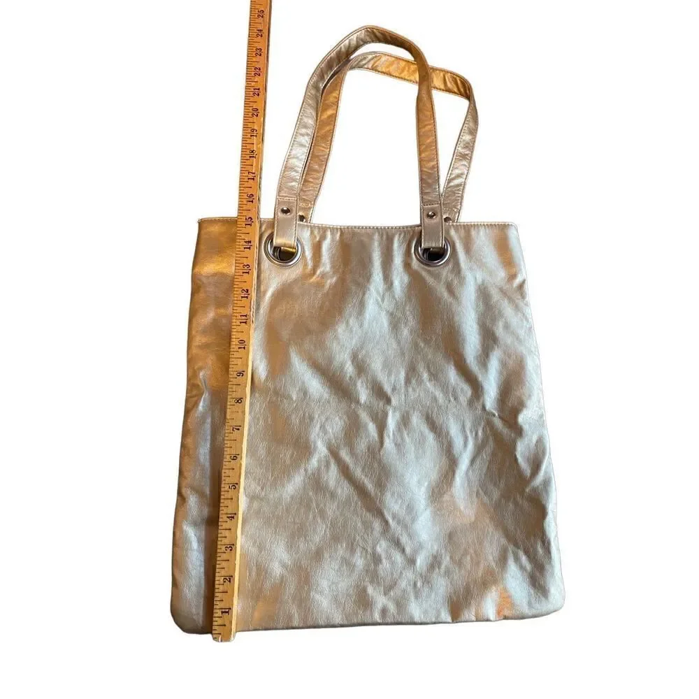 Gold faux leather shoulder bag new with out tags clean